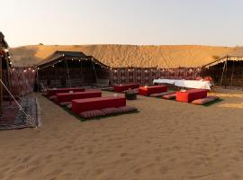 Overnight Desert Camping with Desert Safari Tour & BBQ Dinner, hotel di Dubai