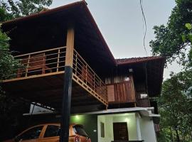 Falcon by wayanora, hotel i Padinjarathara