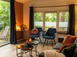 Forrest Lodge in bosrijke omgeving de Veluwe - met terras, tuin en fietsschuurtje, шалет в Нунспет