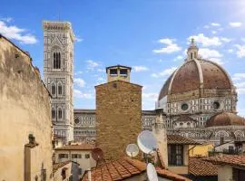 In front of the Duomo