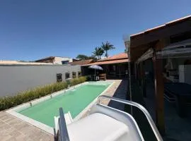 Casa com piscina 500 metros da praia e Ponte Pensil