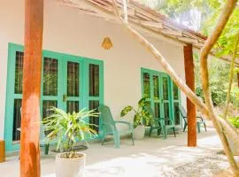 Lazy Monkey Green Chalets