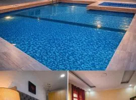 KIGALI WHITE HOMEs AND E6 APARTMENT WITH SWIMMING POOL NEAR THE CITY