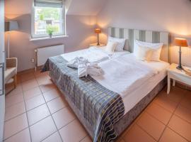 Hotel Hüttmann, hotell i Norddorf