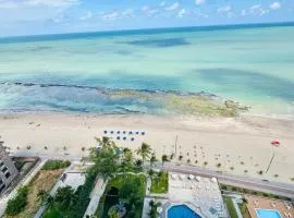 Flat pe na areia frente mar