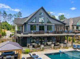 Luxe Lakefront Lodge w Pool Hot Tub Theater Private Dock Sleeps 21