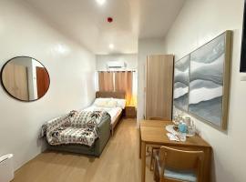 E&J Solace Studio Mactan Bayanihan Flats 2, хотел в Maribago