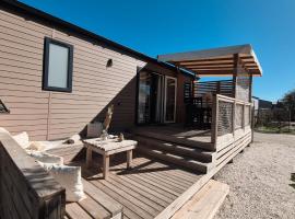 Le Cosy Mobil Home à 150m de la Plage Camping 5 etoiles Les Dunes Parc Aquatique, Hotel in Torreilles