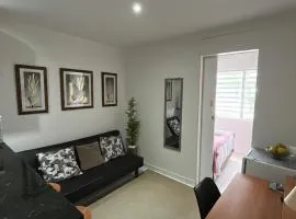 Flat Aconchego BEIRA-MAR térreo quase pé na areia