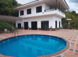 Casa Angola, отель в городе Кайседония