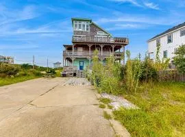 Towering beach house with private pool, hot tub, decks & ocean views