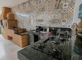 Suítes em casa ampla com área gourmet