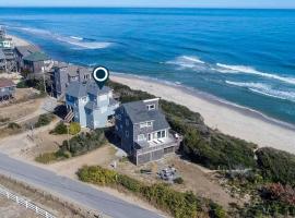 Oceanfront dog-friendly home close to sand with views & private hot tub, hotel en Buxton