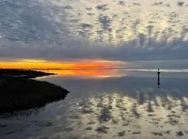 Sound-front house with private washer/dryer, central AC, and private hot tub