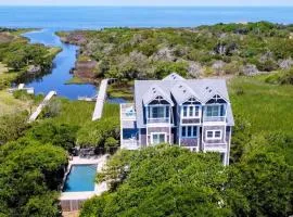 Waterfront home with ocean views, private pool & hot tub