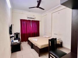 Hotel Downtown Lodge Manipal, готель у місті Маніпала