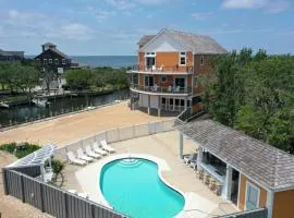 Waterfront home with ocean views, private pool, hot tub, & Tesla/EV charger