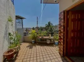 Mindful Rooftop Yoga Stay in Gokulam Bright, Airy Private Family Terrace Apartment
