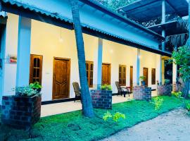 OM Inn, hotel em Triquinimale