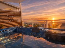 Spa Rooftop & Piscine chauffée- Villa des 4 Sens vue Océan, Hotel in Le Tampon