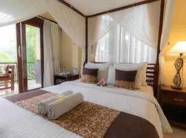 Deluxe room upper floor with pool nature view