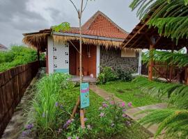 Breeze and Blossom Cottage Maguwo, hôtel à Adi Sutjipto