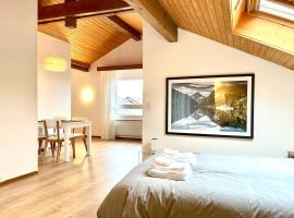 Relaxed Loft Stay Between Lake & Mountains, hotel in Leissigen