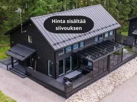 Himos Mökit - Villa Alppinotko 6 A - Huvila Ulkoporealtaalla - Hyvä sijainti keskellä Himosta - Siivous sisältyy hintaan - Ulkoporeallas ja liinavaatteet lisäpalveluina