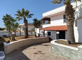 L' Arancio - Bilocale con Giardino e Parcheggio