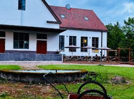 Large apartment on a dairy Building, Hotel in Suomusjärvi