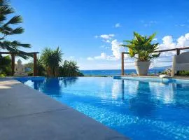 Villa de Luxe Perlane Bay vue mer piscine chauffée