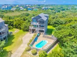 Waterfront house near beach access with AC, private pool & hot tub -dog-friendly