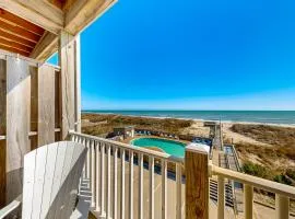 Darling oceanfront condo with outdoor pool, hot tub, balcony & views