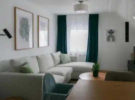 Modernes Apartment mit Boxspringbett, Waschmaschine, Playmobil Funpark