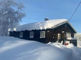 Breidablikk, Quiet Cabin Retreat Surrounded by Nature, Hotel in Etnedal