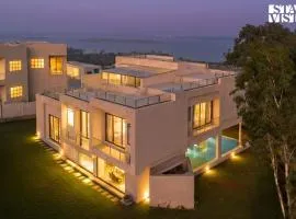 StayVista at Montara View with Infinity Pool, Dam-Mountain View
