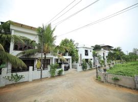 Ashiyana Homes, hotel en Nedumbassery