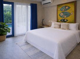 Sleepy Gypsea Villa Siargao Tide, hotel di Catagnan