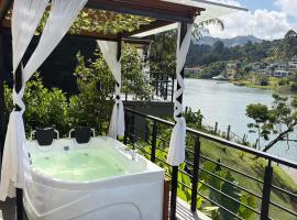 Cabaña con Jacuzzi frente al Lago, Hotel in El Peñol