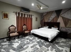Essa Homestay, hotel a Faisalabad