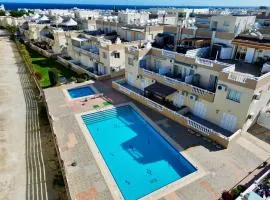 AquaSol Suite Modern 2BR with Shared Pool