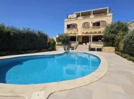 Villa Joanna - Exclusive Boutique Suits