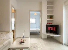 Sunlit Retreat in Voula Center