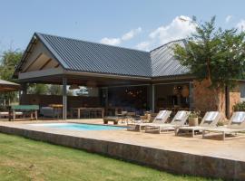 Stroomrivier Lodge, Hotel in Boshoek