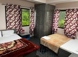 Kalshang homestay, hotel di Aritar