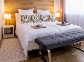 Gelbe Koffer - Design-Apartment in Schiffweiler - 2 Parkplätze - Self-Check-in - ruhig & naturnah – hotel w mieście Schiffweiler