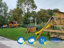 Neues Ferienhaus für Familien mit Garten und Sauna, hotel em Butjadingen