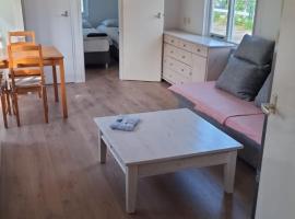 Family Friendly Holiday Chalet with Pool in Holiday Park, Hotel in Opmeer