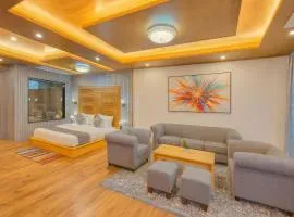 Rockland Cottage Manali - Centrally Heated & Air Cooled Luxury Rooms with Mountain & River View