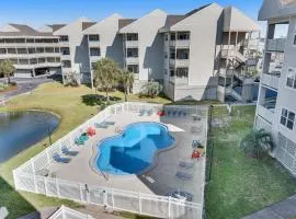 Condo with partial bay view onsite fishing dock beach access & shared pool